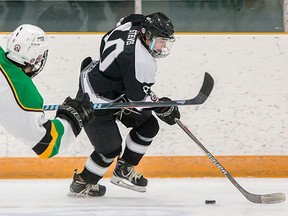 The Napanee Raiders (in black) were eliminated by the underdog Amherstview Jets in Game 7 of their Jr. C semi-final playoff series Tuesday night in Napanee. (Postmedia photo)