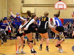 From left to right, Thea Brouwer Brooke Richards, Hannah Petcoff, Maggie McKee, Jensen Tait (hidden) and Natalie Lyons react as the Oakridge Oaks win the gold medal in OFSAA AAA over St. Marcellinus. Oakridge dropped the first set 22-25, but roared with sets of 25-14, 25-16, and 25-13 to the 3-1 win and the gold medal. (Mike Hensen/The London Free Press)