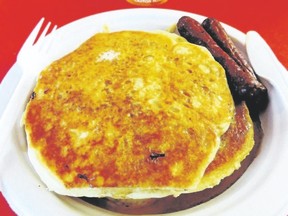 Flapjacks doused in maple syrup along with sausages are popular treats at Shaw’s pancake house near Orillia. (Barb Fox/Special to Postmedia News)