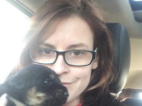 Heather Watling of 4Champ Animal Rescue cuddles a pup collected from Northern Manitoba during the trip back to Sudbury on March 3-4. (Photo supplied)