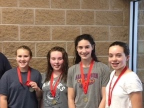 Grade 7 Algonquin Road Public School students Daphne Williams, left, Morgan Proulx, Erin Cole, and Rebekah Thom competed at the Skills Canada Provincial Cardboard Boat Championships in Waterloo. Supplied photo