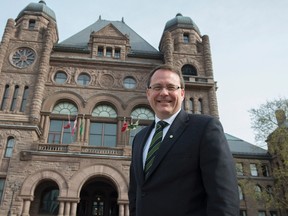 Green Party leader Mike Schreiner poses for a photo in front of the Ontario Legislature in Toronto. Schreiner is scheduled to visit Sarnia March 21 to tour the research park and speak at a Chamber of Commerce event in the evening. (File photo/THE CANADIAN PRESS)