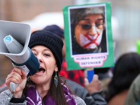 Tim Miller/the Intelligencer
Women and men march through the downtown core to mark International Women's Day on Thursday in Belleville.