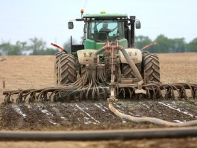 spreading manure