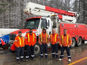 From left, Utilities Kingston crew members Allan Hawley, William Beattie, Kyle Barrett, Sheldon Waterman, and Chris Mills at the Canada-US border on Friday March 9, 2018. Supplied photo