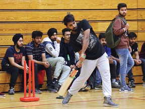 Batsman Benoy Clement, of the Kings, takes part in the annual Cambrian Indoor Cricket Tournament for international students at Cambrian College in Sudbury, Ont. on Friday March 9, 2018. A total of eight teams vied for a trophy and bragging rights. John Lappa/Sudbury Star/Postmedia Network