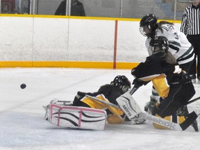 Makayla Beuerman of the Mitchell Bantam girls makes a save during recent league action. ANDY BADER/MITCHELL ADVOCATE