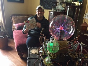 Author and artist Ania Nunns with his new book Mr. A.J. and the Machine, which was inspired by his steam punk adventure machine. (HEATHER RIVERS/SENTINEL-REVIEW)