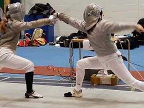 Holly Tetzlaff of the Loyalist Fencing Club (right) competes at the 2018 Ontario Fencing Association championships last weekend at the University of Toronto. (Submitted photo)