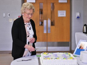 Mary McDonnell, the last founding member of the Active Lifestyle Centre, cuts the cake at her retirement party. She has worked at the centre in all three of its incarnations since 1970. Tom Morrison/Chatham This Week