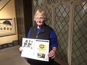Mary Clutterbuck of the Elgin District Women’s Institute holds a mock-up of the front cover to the new book that chronicles the history of the area through stories from members of the organization. The book will be formally launched on March 19. Laura Broadley/Postmedia Network