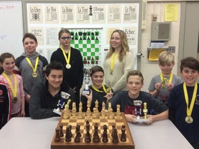 St. Mary’s School Chess Champions 2018. (Back row, standing, L-R): Desmond VandenHeuvel (Grade 1 Champion); Lena VandenHeuvel (Grade 2); Caeleb Bowler (Grade 6); Marika Zantinge (Grade 5); Amelia Denomme (Grade 8); Jacob Corriveau (Grade 3); Cohen Williamson (Grade 4 Champion).
(Front row, sitting, L-R): Justice Palladino (Grade 8, Second Place, Overall); Bryce Burbine (Grade 7, Overall School Champion); Liam Doherty (Grade 7, Third Place, Overall). (Contributed photo)