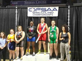 Tyanna Soucy, centre, won gold at the recent OFSAA wrestling championship. Photo supplied