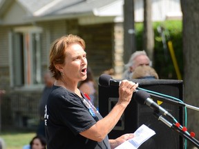 Debi Wells speaking at a Labour Day event in Skeleton Park. Photo Jamie Swift
