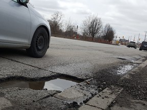 A pothole is shown on Grand Avenue West in Chatham. (Trevor Terfloth/The Daily News)