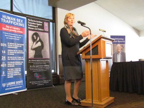 Laurie Scott, MPP for Haliburton-Kawartha Lakes-Brock, speaks at a human trafficking forum hosted Thursday at the Sarnia Golf and Curling Club by Sarnia-Lambton MPP Bob Bailey. Representatives of several police and community agencies took part. (Paul Morden/Sarnia Observer)