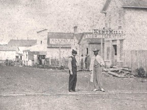 King Street in approximately 1864, looking west from Forsyth Street. When it rained, Chatham’s streets turned to sticky, gooey, horse-swallowing muck. John Rhodes photo