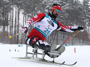 Collin Cameron of Canada competes in the Biathlon Men's 15km Sitting event during the 2018 Winter Paralympics at the Alpensia Biathlon Centre in Pyeongchang, South Korea, Friday, March 16, 2018. Ng Han Guan/Associated Press