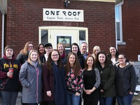 Meghan Balogh/The Whig-Standard
Staff, youth and representatives from multiple youth-serving Kingston organizations gather outside One Roof Youth Services Hub in Kingston.