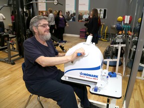 Empire Life committed $15,000 per year for three years to fund programs at the Kingston YMCA's Health and wellness studio 
Kingston YMCA Health and Wellness Studio participant Dave Dundas exercises after Empire Life committed $15,000 per year for three years to fund programs at the Kingston YMCA's Health and wellness studio on Friday March 16 2018. Ian MacAlpine/The Whig-Standard/Postmedia Network