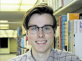 Jackson Pind is seen in the Queen’s University Education Library. (Steph Crosier/The Whig-Standard/Postmedia Network