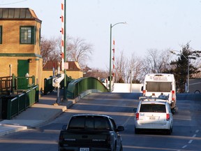Vehicles pass over the Lord Selkirk Bridge in Wallaceburg March 16, 2018. A rehabilitation project on the Sydenham River crossing received $3 million in funding from the provincial government. (David Gough/Postmedia Network)