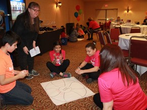 Teacher Sharon Berg leads a group of young newcomers through an activity where they share the challenges they've faced in moving to a new country, during Sarnia-Lambton's first-ever Newcomer Youth Summit on March 15.
CARL HNATYSHYN/SARNIA THIS WEEK