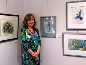 Sarnia artist Rozanne Leystra stands beside a selection of her paintings at the March 11 launch of the Nature's Portraits and Landscapes exhibition at Gallery in the Grove. The exhibition runs until April 14.
CARL HNATYSHYN/SARNIA THIS WEEK