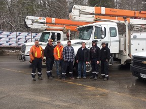 Submitted photo
A crew of seven Veridian Connections workers, including Belleville Field Supervisor Joe Lonsberry (third from right) and Belleville linesmen Jeff O’Neil (second from right) and Justin Henriquez (right), have returned from Connecticut after helping Eversource, New England’s largest energy company, repair electrical infratructure and restore power to thousands affected by a series of storms.