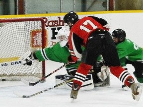 Tweed's Aaron Purvis scores against Cayuga during Game 1 of the OMHA juvenile CC-C finals in Tweed. Hawks lead the six-point series, 4-2. (Cathy Yeager photo)