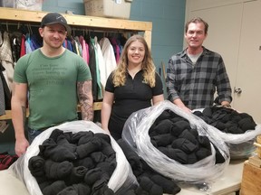 Supplied photo
Cambrian College’s First Generation Advising Program donates 1,000 pairs of socks to the Samaritan Centre. From the left are Matt Soulliere, Prep Cook, Elgin Street Mission, housed at Samaritan Centre; Andrea Manson, third-year physical fitness management student, Cambrian College; and Kevin Serviss, executive director, Samaritan Centre.