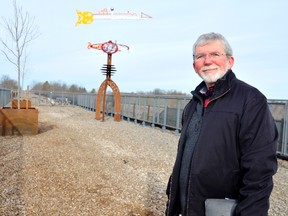 Serge Lavoie, president of On Track St. Thomas, stands in the soon-to-be-complete phase one of Elevated Park, a Canada-first project under construction on St. Thomas's west side. The project was just gifted a "significant donation" be the local Kinsmen Club to build a sun shade later this summer. (Louis Pin/Times-Journal)