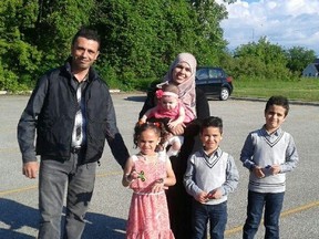 Syrian refugee Houda Alzoubi (centre) is shown with husband Jaber Al Mudeer and her children Nour, Hiba, Mohammad and Odai. Alzoubi will be cooking traditional Syrian food for a fundraiser for the Women's Interval Home of Sarnia-Lambton on March 23.
Handout/Sarnia This Week
