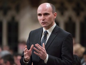 Families, Children and Social Development Minister Jean-Yves Duclos rises in the House of Commons in Ottawa on Friday, May 6, 2016. Families Minister Jean-Yves Duclos defended Service Canada's decision to ask its employees to adopt gender-neutral language when interacting with the public, as members of the opposition mocked the policy mercilessly. THE CANADIAN PRESS/Adrian Wyld
