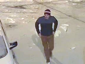 Kingston Police are asking for the public's help in identifying a suspect wanted for damage to a vehicle in a back parking lot on Queen Street on Wednesday March 14 2018. Ian MacAlpine/The Whig-Standard/Postmedia Network
