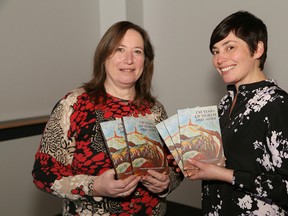 Publishers Heather Campbell, left, and Laura Stradiotto, of Latitude 46 Publishing, are holding a book launch at the McEwen School of Architecture in Sudbury from 2-4 p.m. on Saturday, March 24. The book, 150 Years Up North and More, features true stories of immigration and colonization. The book was edited by Stradiotto and Karen McCauley. John Lappa/Sudbury Star/Postmedia Network