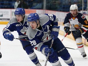 Drake Pilon (28) of the Sudbury Wolves breaks to the net while Darian Pilon (29) follows during OHL action against the Barrie Colts at Sudbury Community Arena in Sudbury, Ont. on Friday, January 26, 2018. John Lappa/Sudbury Star/Postmedia Network