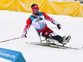 Collin Cameron of Canada competes in the men's 15km sitting biathlon event of the Pyeongchang Winter Paralympic Games at the Alpensia Biathlon Centre on March 16, 2018. / AFP PHOTO / Jung Yeon-jeJUNG YEON-JE/AFP/Getty Images