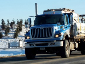 File photo/Postmedia 
A truck passes by the Twin Creeks Landfill near Watford. Lambton County council will be asked in April to consider a resolution calling for the province to give municipalities the power to approve or reject new landfill project.