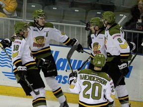 North Bay Battalion player Luke Burghhardt, third from left, celebrates the club's first goal against the Kingston Frontenacs during Game 1 of their Ontario Hockey League Eastern Conference quarter-final series at the Rogers K-Rock Centre in Kingston on Friday. (Ian MacAlpine/The Whig-Standard)