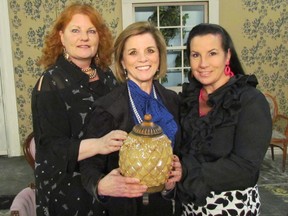 Paul Morden/Sarnia Observer/Postmedia Network
Cast members Marnie Austin, Mary Ann Hucker and Rhonda Ross hold an urn that also plays a role in the Theatre Sarnia production of Exit Laughing, running April 13 to 21 at the Imperial Theatre