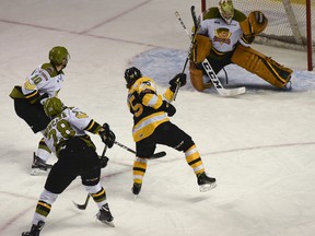 Kingston Frontenacs’ Linus Nyman puts a hard shot past North Bay Battalion goaltender Christian Propp to put the Fronts first on the board during the first period of Ontario Hockey League Eastern Conference quarter-final action at the Rogers K-Rock Centre on Sunday.