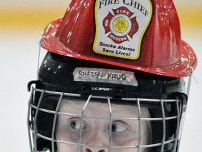 Shelby Krug, dressed as a junior firefighter, was one of many young skaters to show off their skills during a mini showcase held at the Mitchell Skating Club’s year-end event last Monday, March 19 at the Mitchell & District Arena. ANDY BADER/MITCHELL ADVOCATE