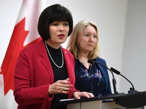 Minister of Health Ginette Petitpas Taylor speaks during an announcement on funding for the opioid crisis, as Liberal MP for Ottawa-Vanier Mona Fortier looks on, in Ottawa on Monday, March 26, 2018. The government is making it easier for patients to access prescription heroin and methadone in its fight against the opioid crisis.THE CANADIAN PRESS/Justin Tang