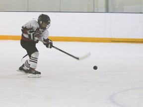 Hawk Dryden Scobie scores early in the second period to tie the game at 3-3 during the deciding game of the final of the Tier 5 West playoffs of the Central Alberta Hockey League. The Hawks lost 7-5 to Beiseker at the Vulcan District Arena. Jasmine O'Halloran Vulcan Advocate