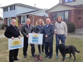 Shown from left are Keith Koke and Ed Koke, MC Business; Helen Robertson, co-chair of the Hike for Hospice Committee; Wally Romansky, MicroAge; Josette Debrouwer, committee co-chair, with Leigha, Hike for Hospice puppy participant. (Handout/Postmedia Network)