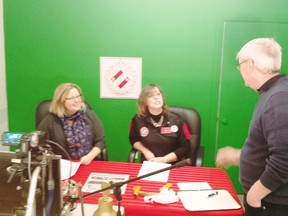 Goderich Kinsmen Life Member Bill Pollock with Kinette Deputy Governor Melissa Penner and MPP Lisa Thompson, during the on air, live auctioneering time slot. (Contributed photo)
