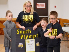 Sarah N., South Plympton Public School vice-principal DeeAnna Stokes, Gavin H. and Connor R. were at Mayor Lonny Napper’s awards ceremony in February, which raised $1,600 for a final celebration at South Plympton Public School. (File photo)