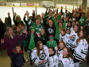 The Lucan community joined together at the Lucan Community Memorial Centre on March 17 to hear the news about the town cracking Kraft Hockeyville’s top four. Pictured are members of the Lucan community with Mayor Cathy Burghardt-Jesson and some of the Lucan Irish Bantam C team cheering the news by the Lucan ice. (William Proulx/Exeter Lakeshore Times-Advance)