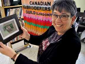 Pat Ferries, president of Canadian Embroiderers’ Guild London, holds artwork by Joy Lajoie-Cowell. The guild’s annual Textile Showcase is April 20-21. (CHRIS MONTANINI\LONDONER)